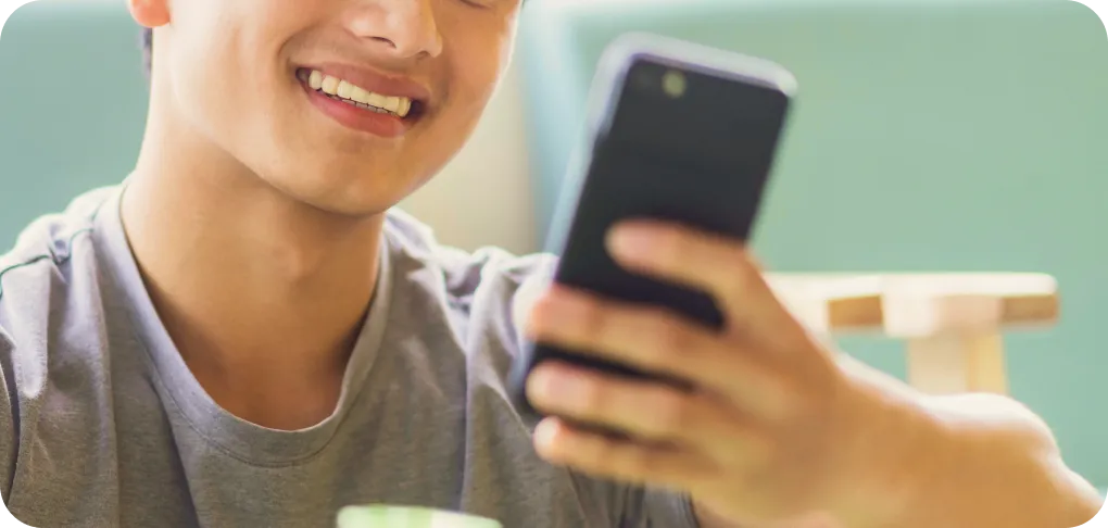 Gym user checking availability on phone